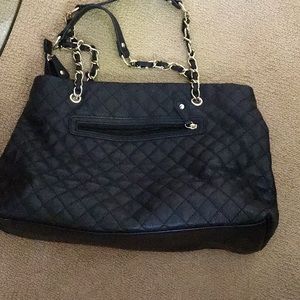 Very large faux leather black bag quilted